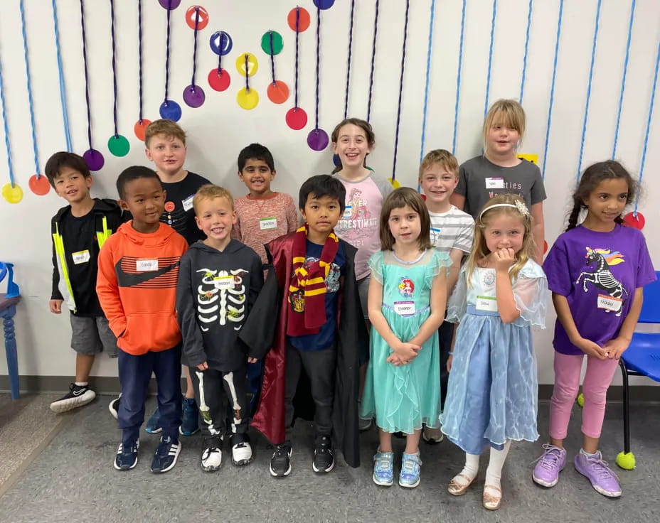 a group of children posing for a photo