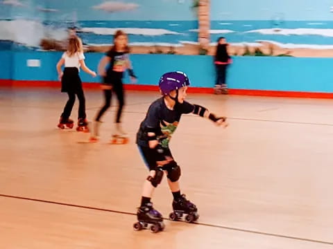 a group of people rollerblading