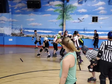 a group of people wearing helmets and roller skates