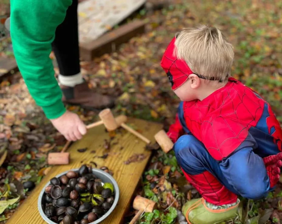 a child playing with a stick