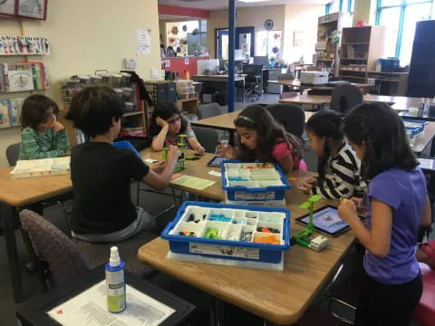 a group of children in a classroom