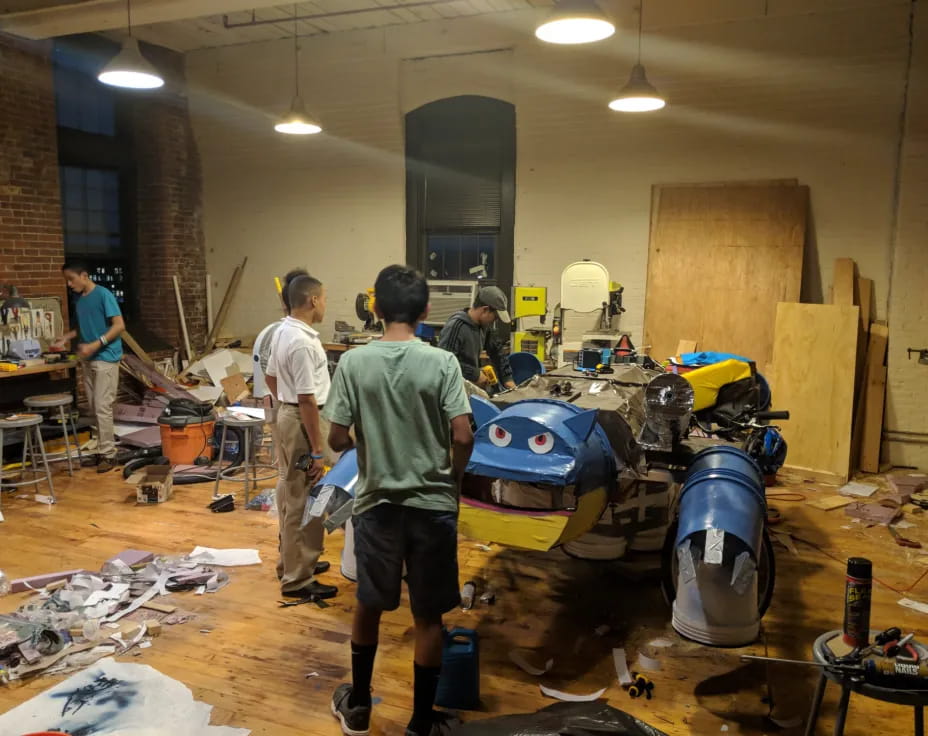 a group of people working in a room