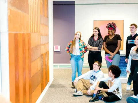 a group of people standing in a room