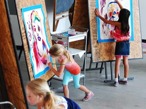 a group of girls painting