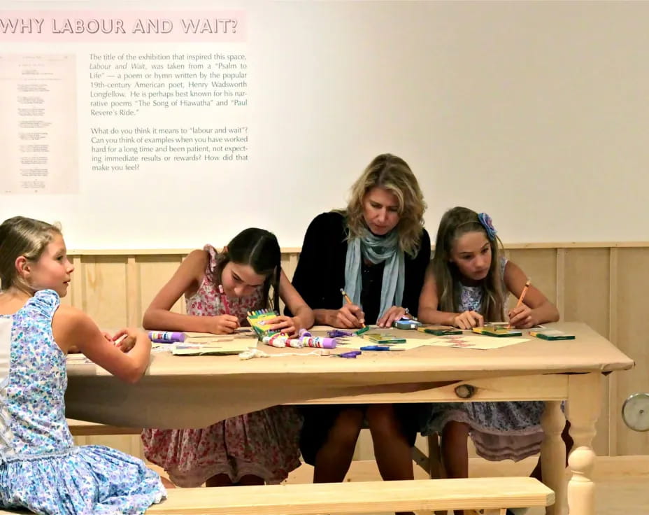 a group of women sitting at a table