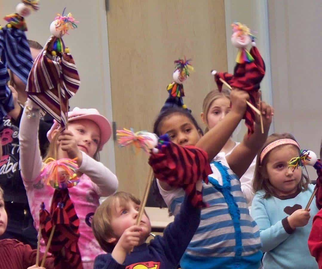 a group of children wearing clothing