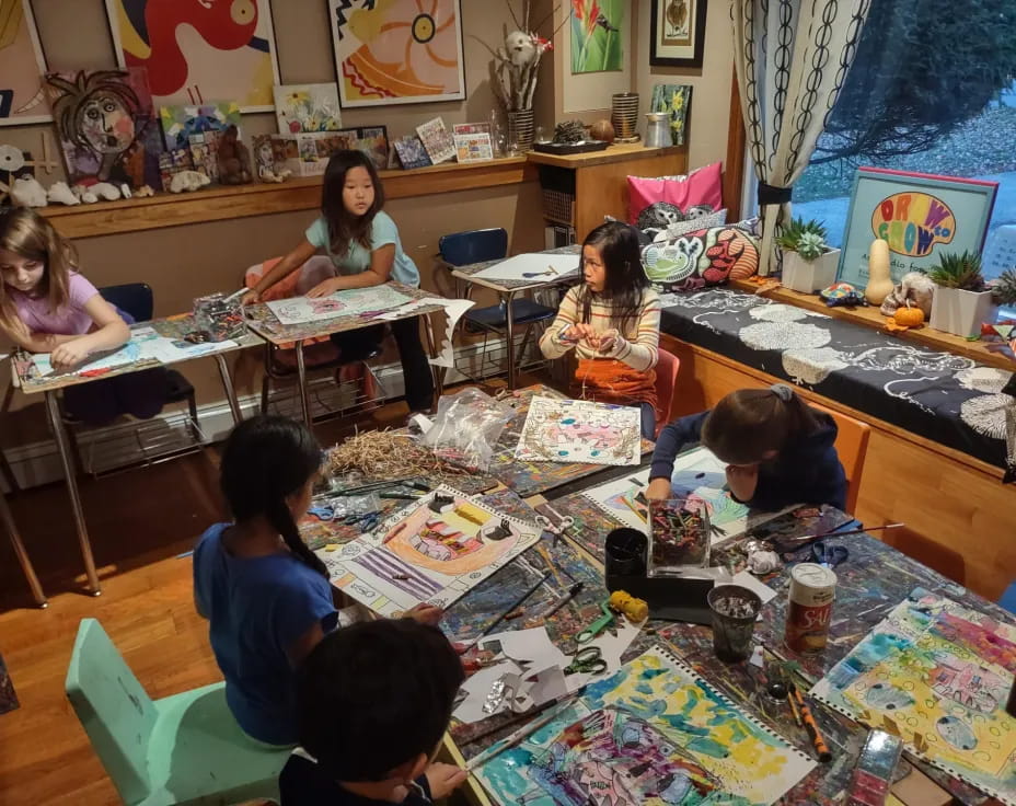 a group of people sitting around a table