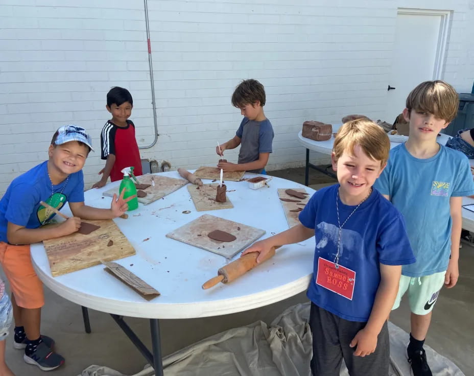 a group of boys playing a board game