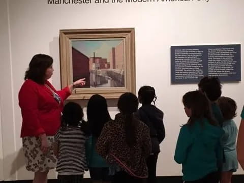 a group of people standing in a room