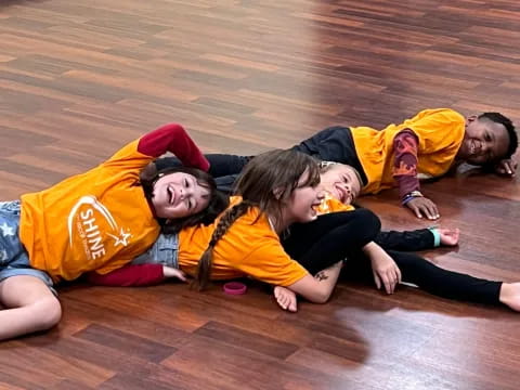 a group of people lying on the floor