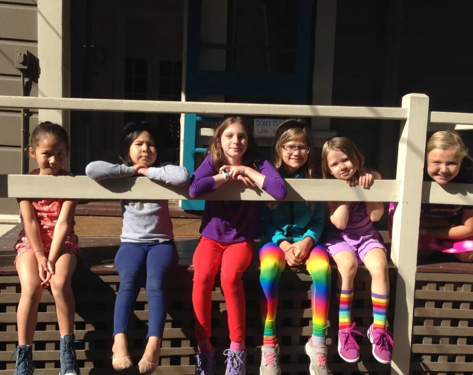 a group of children posing for a photo