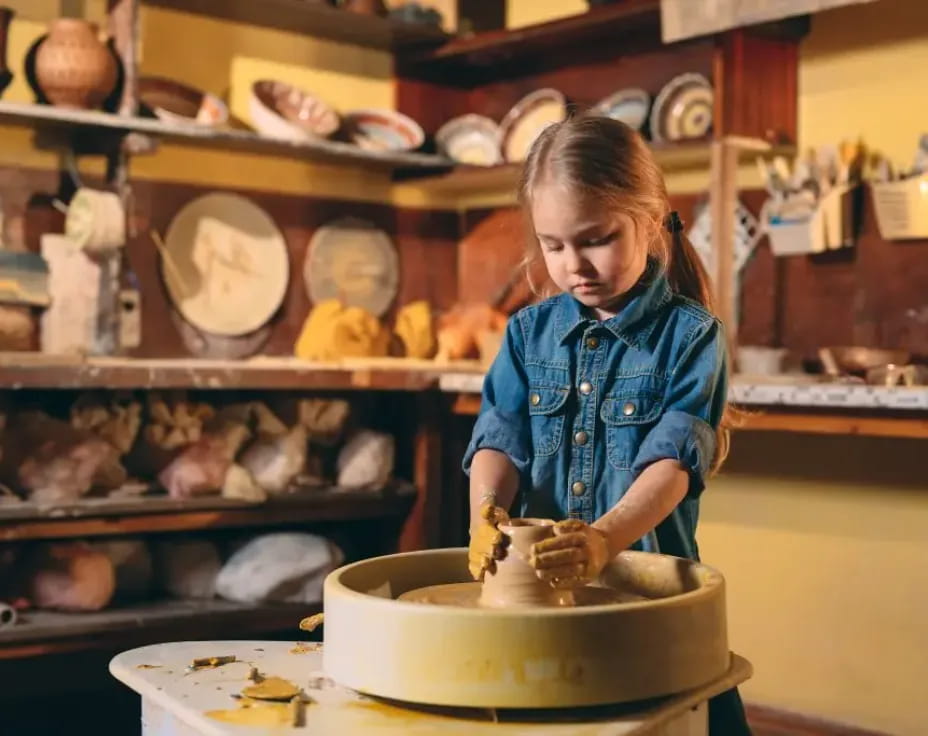 a girl making a cake