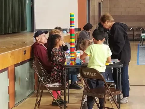 a group of people sitting at a table