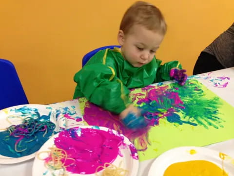 a child sitting at a table