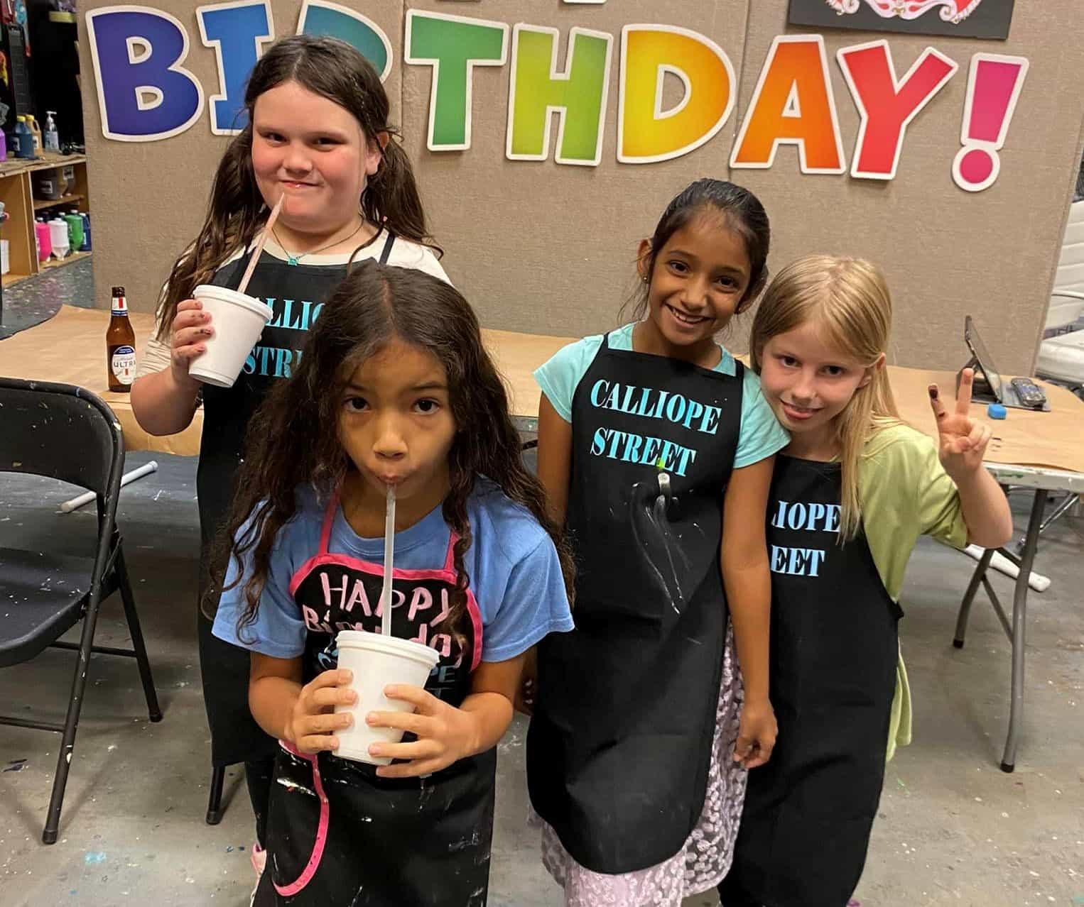 a group of girls posing for a photo