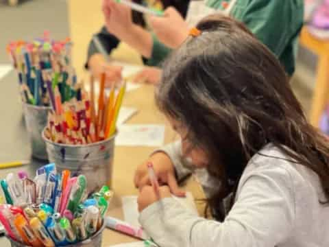 a young girl painting