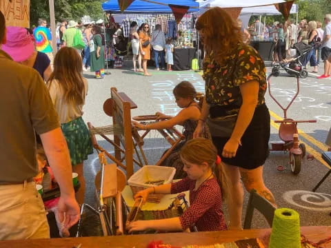 a group of people at a water fountain