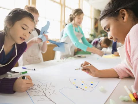 a group of children working on a project