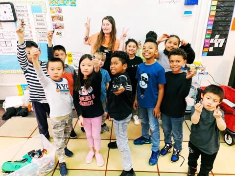 a group of children posing for a photo