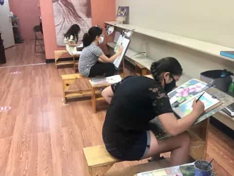 a group of people sitting at a table