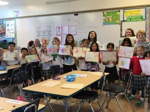 a group of children in a classroom