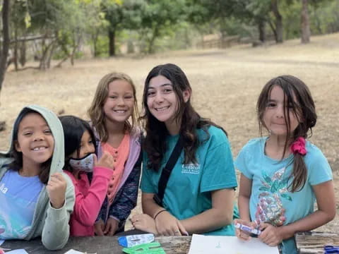 a group of girls posing for a photo