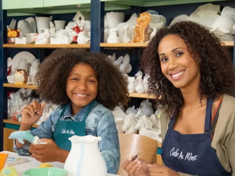 a couple of women smiling