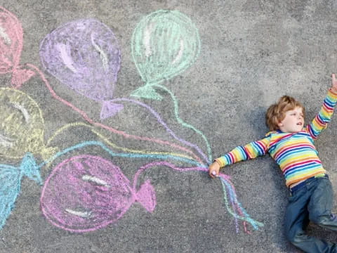 a child playing with a drawing