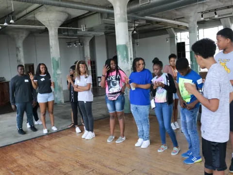 a group of people standing in a room