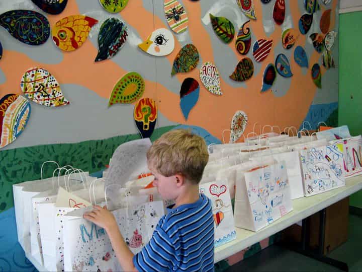 a boy sitting at a table