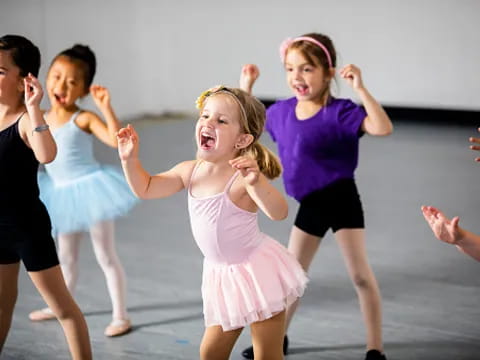 a group of girls dancing