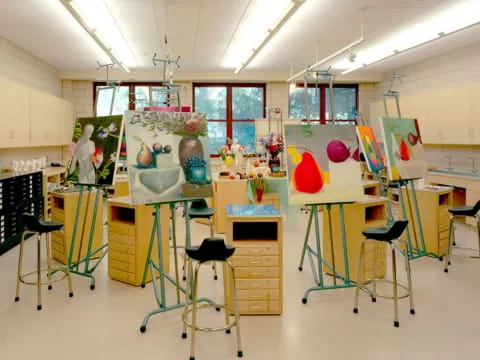 a classroom with desks and chairs