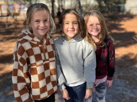 a group of girls posing for a photo