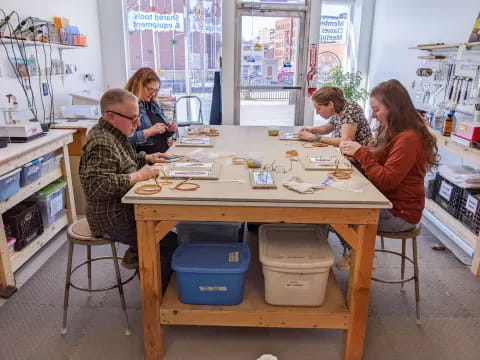 a group of people sitting at a table