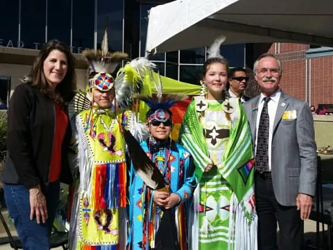 a group of people posing for a photo