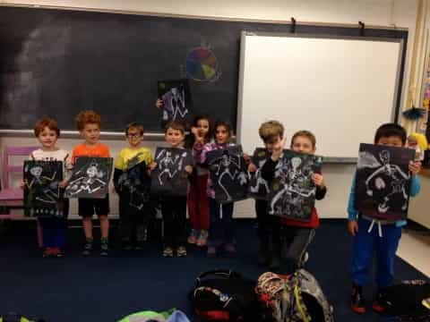 a group of children in a classroom