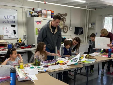 a group of people in a classroom