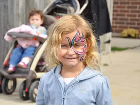 a girl with a face paint