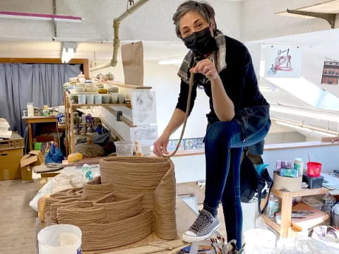 a person taking a picture of a table with objects on it