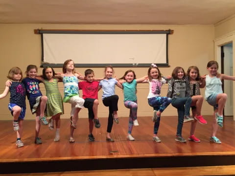 a group of girls posing for a photo