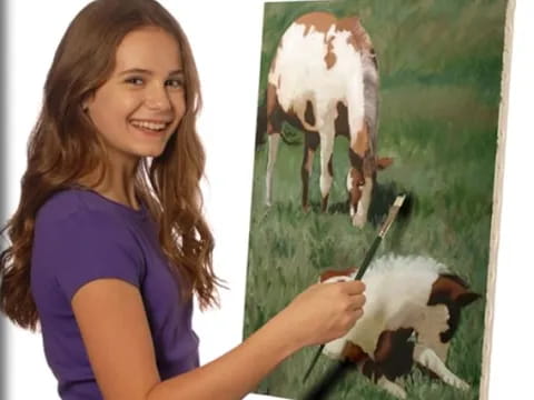 a woman feeding a cow