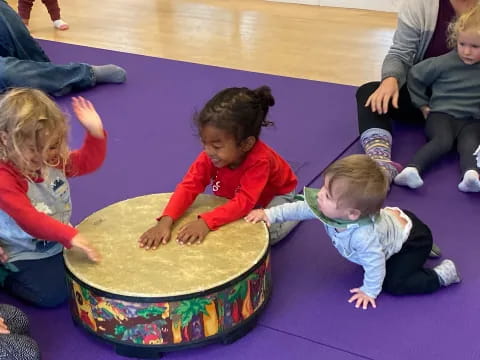 a group of children playing on the floor