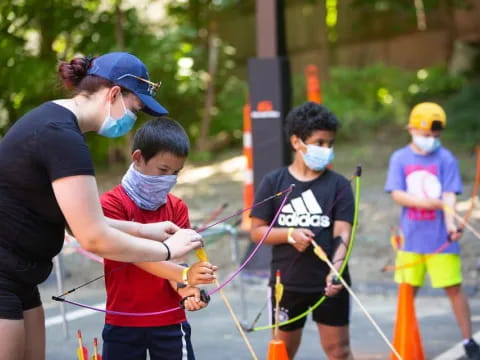 a group of kids wearing face masks