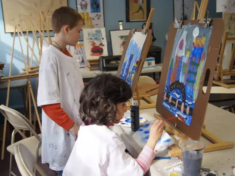 a few children painting