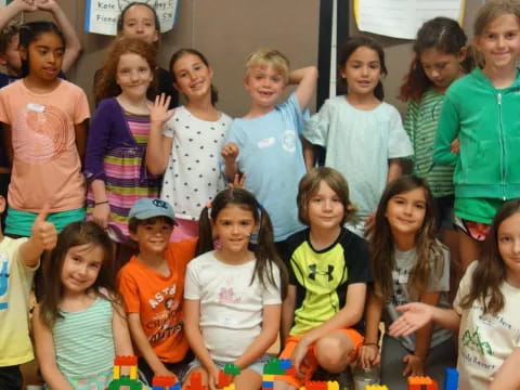 a group of children posing for a photo