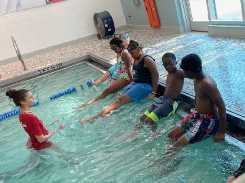 a group of people in a pool