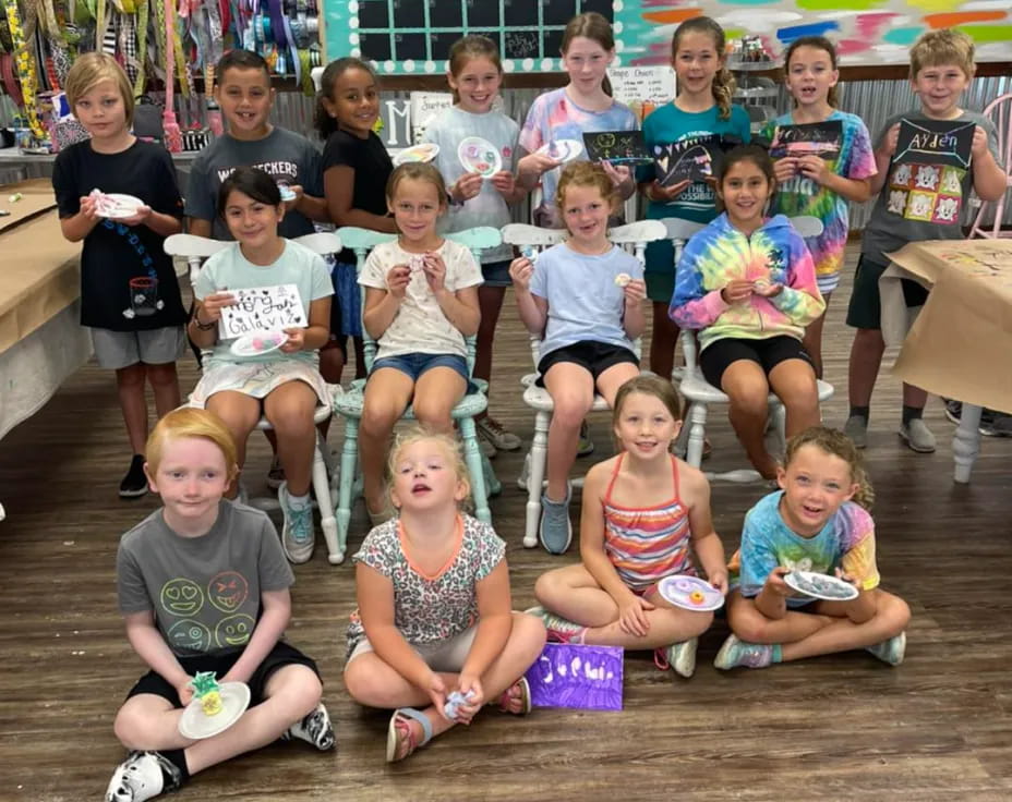 a group of children posing for a photo