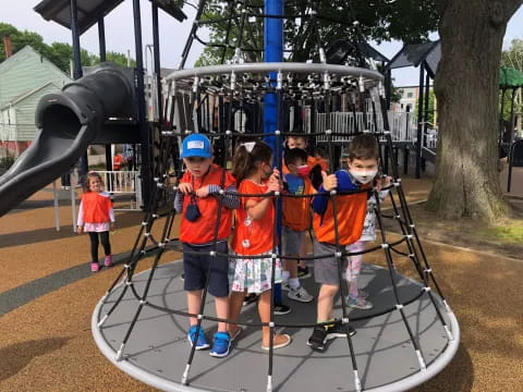 a group of kids on a playground