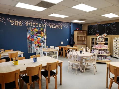 a room with tables and chairs