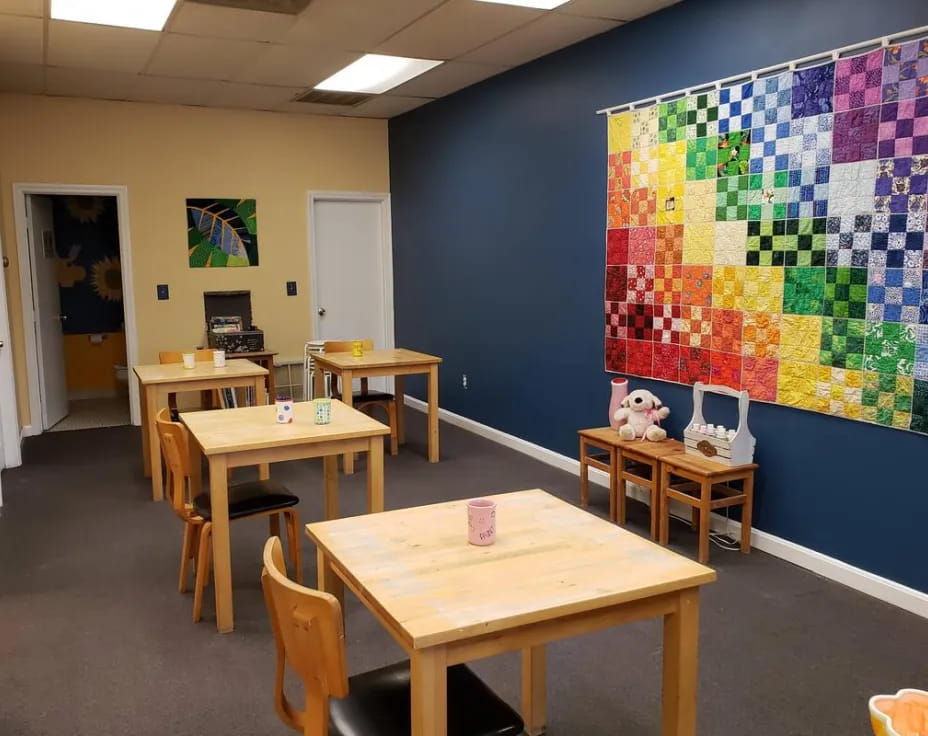 a room with tables and chairs